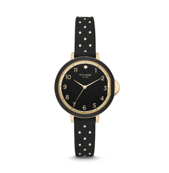 Montre kate spade new york doré rose dotée d’entre-cornes en forme de pique.